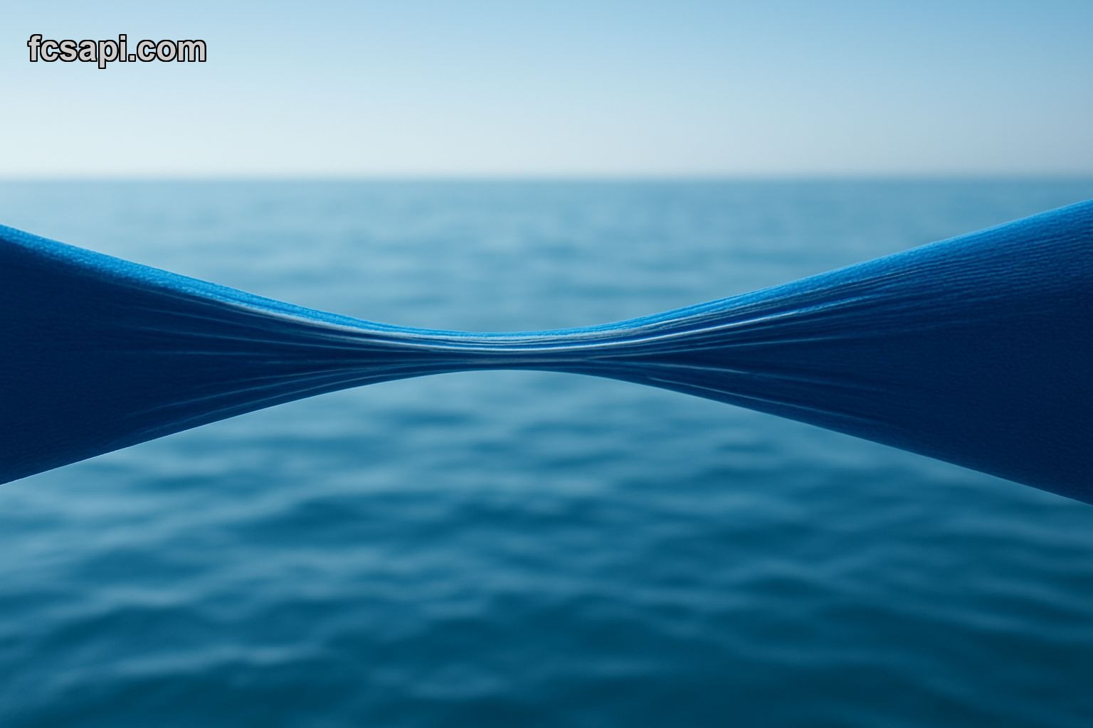 Stretched blue elastic band, representing market overextension.